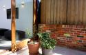 Rear courtyard and glass doors